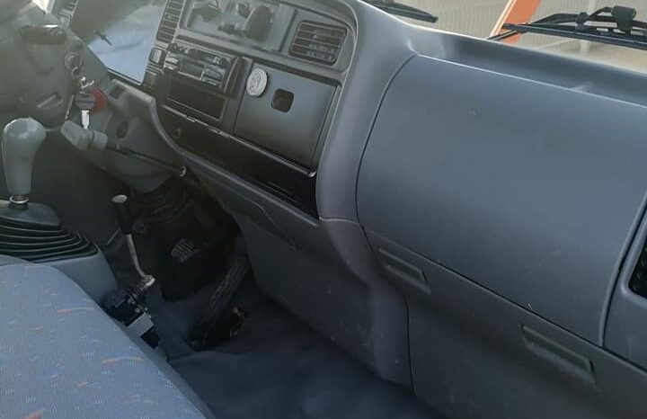 Mitsubishi Canter Tribasculante completo