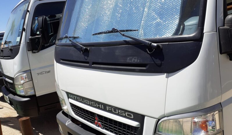 MITSUBISHI CANTER FUSO (7-LUGARES 7.5OOKILOS TRIBASCULANTE) completo