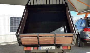 NISSAN NAVARA 4X4 (4 LUGARES BASCULANTE) completo