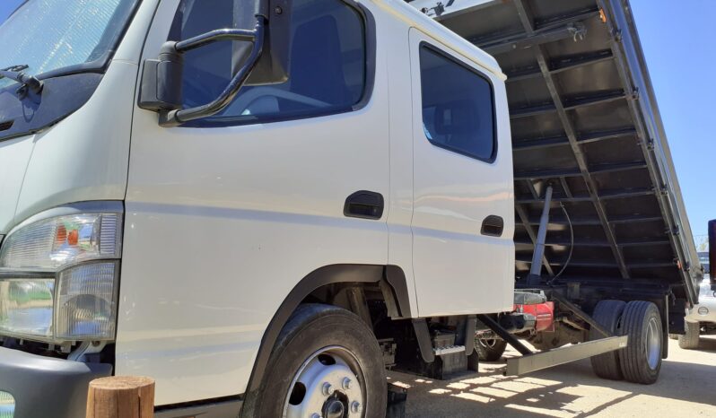 MITSUBISHI CANTER FUSO (7-LUGARES 7.5OOKILOS TRIBASCULANTE) completo