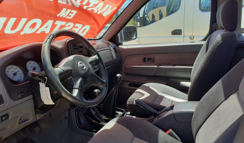 NISSAN NAVARA 4×4 (4-LUGARES) completo