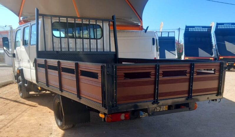 NISSAN CABSTAR  (CABINE TRIPLA 9 LUGARES COM CAIXA) completo