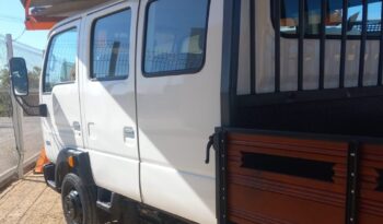 NISSAN CABSTAR  (CABINE TRIPLA 9 LUGARES COM CAIXA) completo