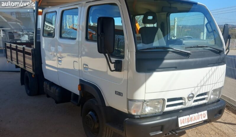 NISSAN CABSTAR  (CABINE TRIPLA 9 LUGARES COM CAIXA) completo