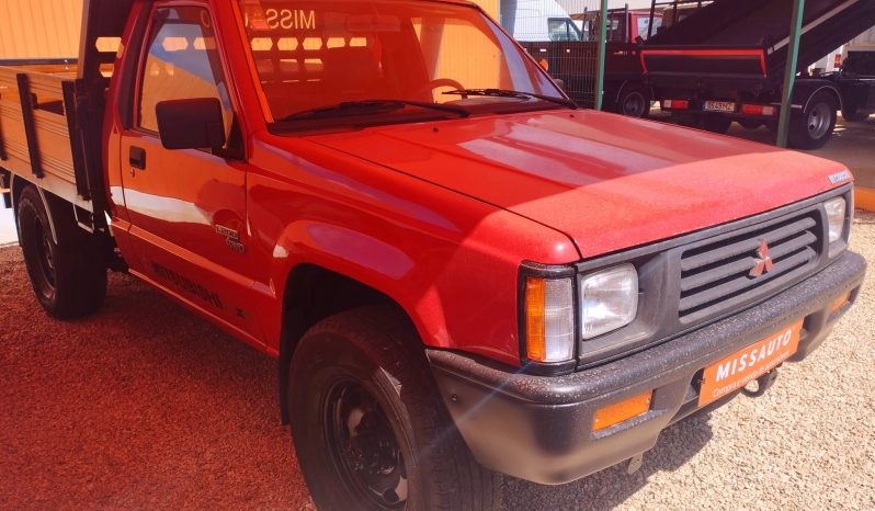 MITSUBISHI L200 4X4 (CAIXA DE MADEIRA) completo