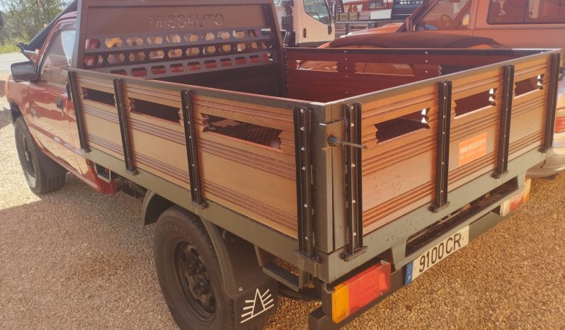 MITSUBISHI L200 4X4 (CAIXA DE MADEIRA) completo