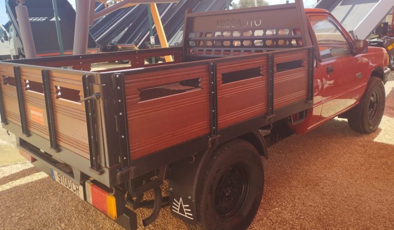 MITSUBISHI L200 4X4 (CAIXA DE MADEIRA) completo